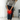 Woman holding her knee in pain with a red highlight, indicating knee injury or pain.